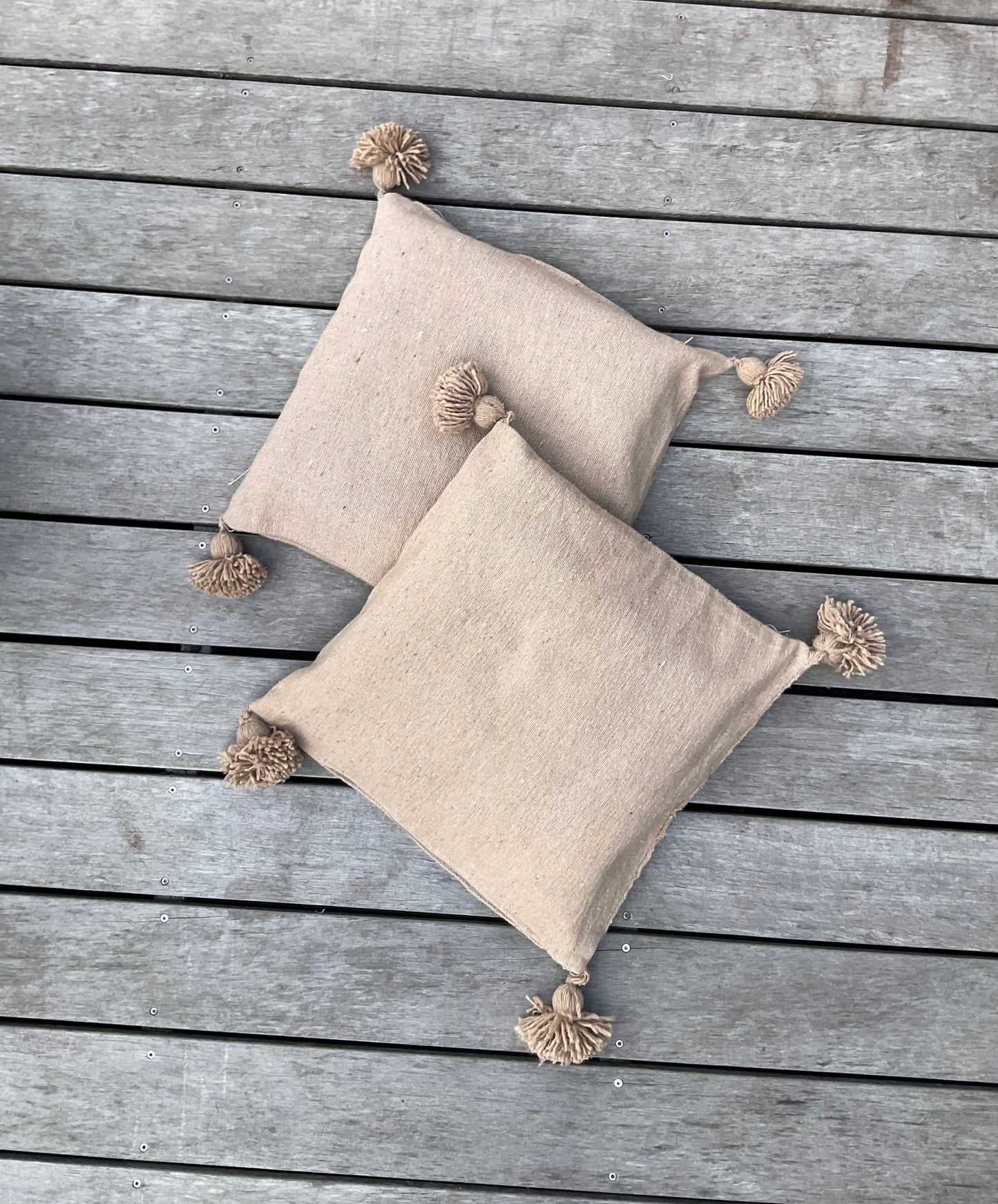 Housse de coussin pompons spéculos