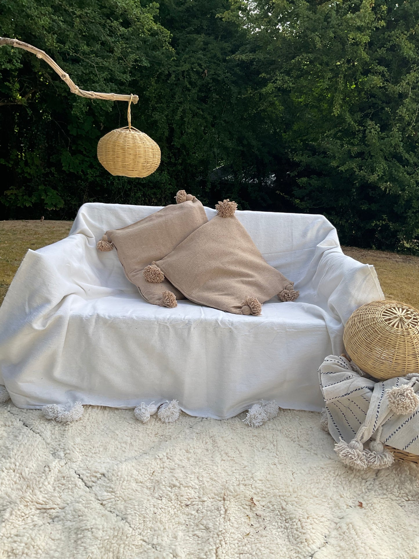 Housse de coussin pompons spéculos